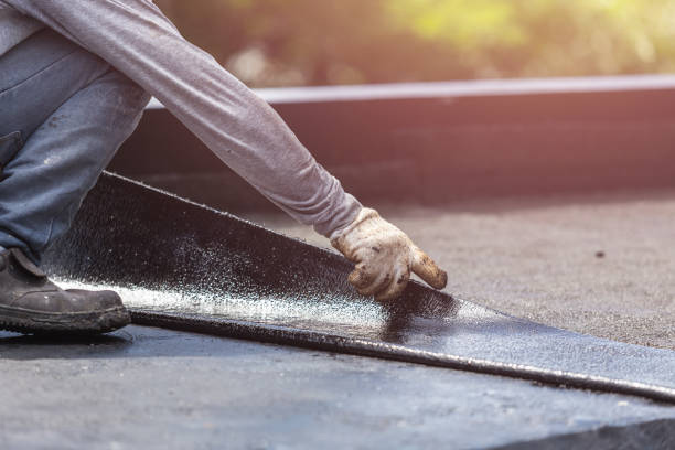 Professional Waterproofing technician working in Georgetown, GA